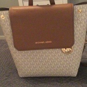 MK, back bag ,light grey, in  perfec condition.